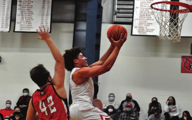 KEYSHAUN ELLIOTT attempts a layup for Richmond against Gallatin. SHAWN RONEY | Staff