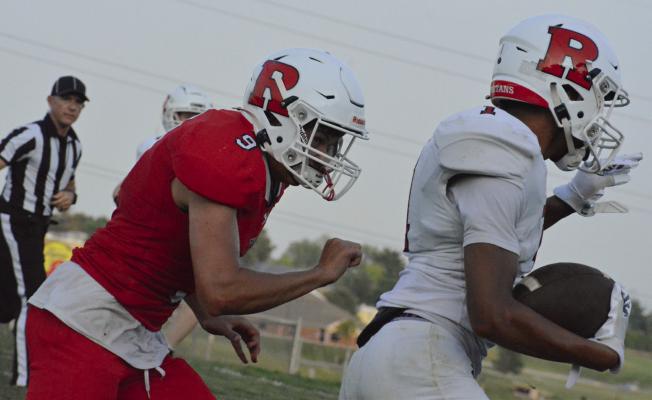 BRICE DOME (right), shown eluding Mattox McCloud, is among Richmond’s skill position players with high potential, according to coach Nick Persell. SHAWN RONEY | Staff