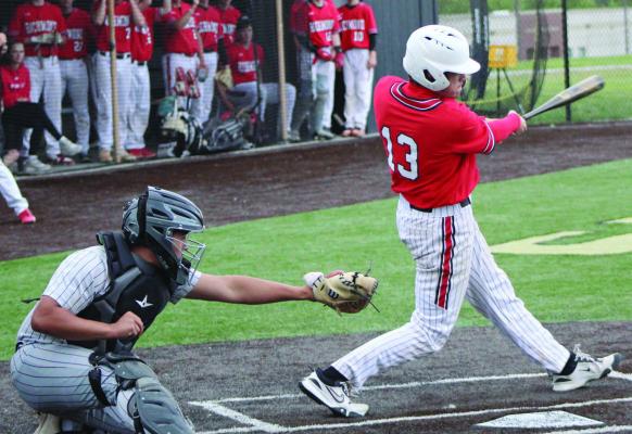 NOAH STEVENS-BREHM (right) swings at a pitch during Richmond’s 8-1 loss to Benton of St. Joseph in Class 4 District 15 play. At press time, Benton was preparing to play Excelsior Springs Thursday for the district championship. Richmond finished its season 7-14 with the defeat in the single-elimination varsity baseball tournament. MIRANDA JAMISON | Staff