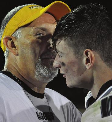 ORRICK COACH Kirk Thacker, left, reunites with Norborne Hardin-Central’s Kobe Gibson after Orrick’s 80-34 Oct. 8 home victory over NHC, a win that Thacker finds unpleasant as NHC’s former varsity 8-man football coach. SHAWN RONEY | Staff