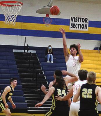 JUNIOR KEYSHAUN ELLIOTT, seen taking a short jumper, and fellow Richmond big man Jack Gogue are too much for Windsor on Tuesday. J.C. VENTIMIGLIA | Staff