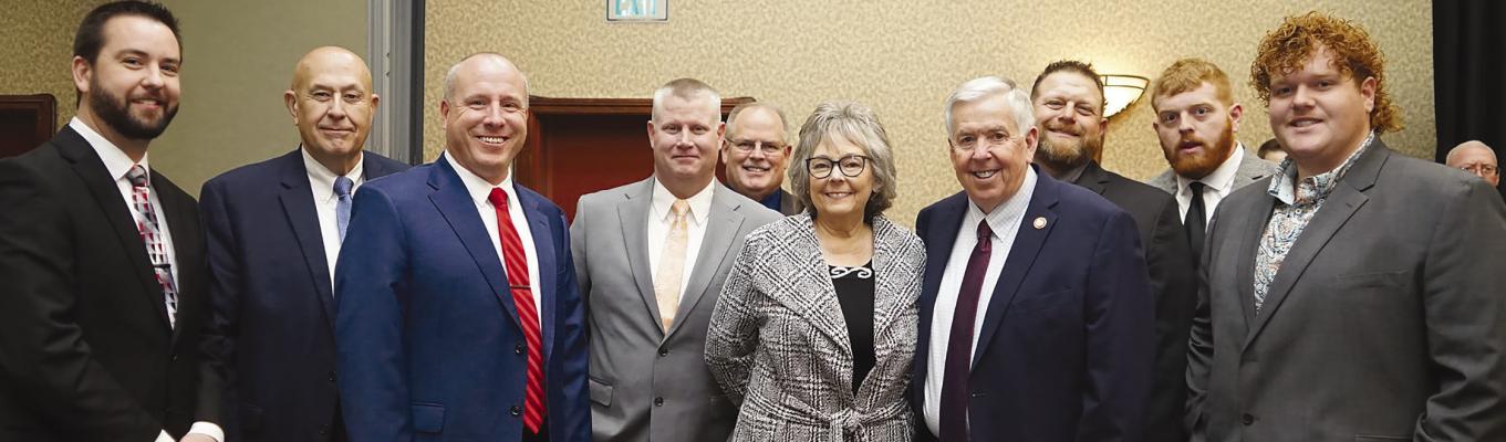 DANIEL PETET (from left), Terry Thompson, Michael Stephenson, Billy Gaines, Willie Isaacson, Peggy McGaugh, Mike Parson, Jeremy Greer, Ross Greer and Cooper Greer meet and greet in Jefferson City. Submitted