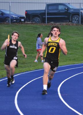 ORRICK SOPHOMORE Jaxson Miller, winner of the boys long jump Tuesday at Higginsville, shows he can run relays, too. SHAWN RONEY | Staff