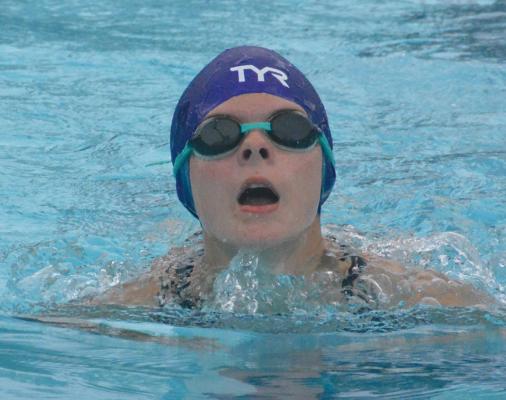 GRACE BOZARTH swims the breaststroke while competing for the Richmond Dolphin Swim Team in meet competition June 25 at Southview Pool. SHAWN RONEY | Staff