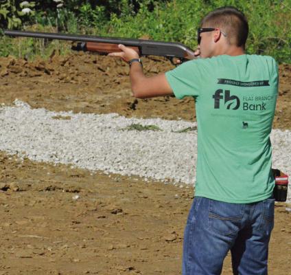 AIDEN O’DELL, a member of the Millville 4-H Club, takes aim during the trap shooting competition at the Ray County Fair. SHAWN RONEY | Staff