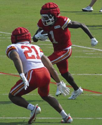DEFENSIVE BACK Jaden Hicks (left) and wide receiver Xavier Worthy compete against each other at a Kansas City Chiefs training camp session, contributing to a near-perfect day. SHAWN RONEY | Staff