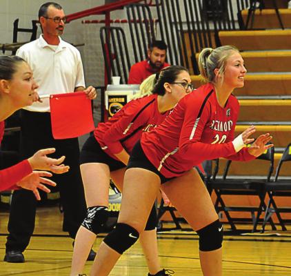 FROM LEFT, Kyli Thornberry, Laney Moyer and Destiny Kincanon are ready to receive a first-set serve on the back row during Richmond’s Oct. 23, Class 3 District 16 semifinal with Cameron at Cameron. SHAWN RONEY | Staff