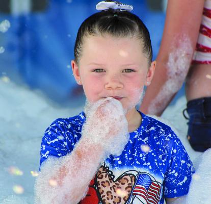 KIDS OF ALL ages enjoyed foamy fun, including Zailee Kilpatrick. SHARON DONAT | Staff