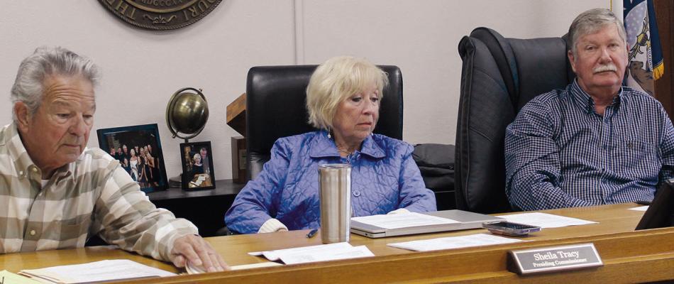 RAY COUNTY COMMISSIONERS Max Hockemeier (from left), Shelia Tracy and Bobby Don Davis listen to public comments as residents raise concerns about drainage issues, county procedures and roadway maintenance. MIRANDA JAMISON | Staff