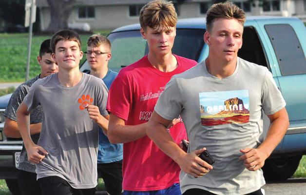 IN AUGUST, Mason Freece leads the Hardin-Central cross country team on a morning run. In November, he is leading the Bulldogs to the Class 1 state meet at Columbia. SHAWN RONEY | Staff