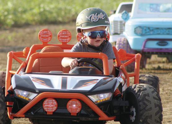 KYLE AKSAMIT focuses on the course as he makes his way around the track.
