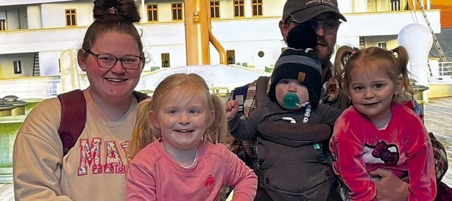 ASHLEE WILLIM-KIRKHAM credits the support of her husband, TJ; and their children, Winnie, Daphnie and Theodore, with helping her along the path to earning her funeral director’s license. Submitted