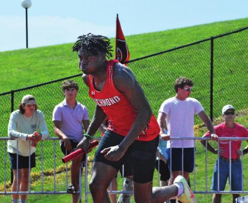 JACOBY JOHNSON runs his leg of the 1,600-meter relay May 14 at district competition at Chillicothe. He and his teammates place third. SHAWN RONEY | Staff
