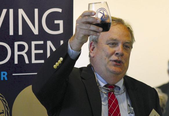 KIWANIAN GOVERNOR Paul Sherman toasts the next 100 years for the Richmond Kiwanis Club. SOPHIA BALES | Staff