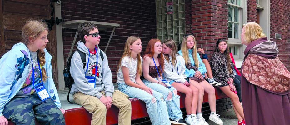 STUDENTS EXPLORE ALEXANDRIA, VA., during a ghost tour while learning about the city’s historic past. Submitted