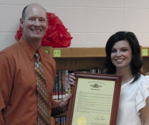 RICHMOND SCHOOL DISTRICT Superintendent Dr. Bryan Copple (left) presents Teacher of Year Nominee Jessica Backs with a proclamation. SHARON DONAT | Staff