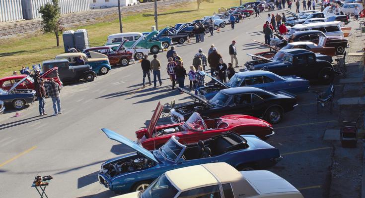 MAIN STREET IN ORRICK comes alive with excitement as crowds gather to admire a stunning display of vintage cars and trucks. SHARON DONAT | Staff