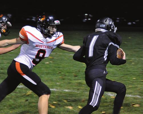 FIRST-YEAR high schooler Kalel Bowman carries the football for Norborne Hardin-Central on Oct. 16 at Hardin-Central. SHAWN RONEY | Staff