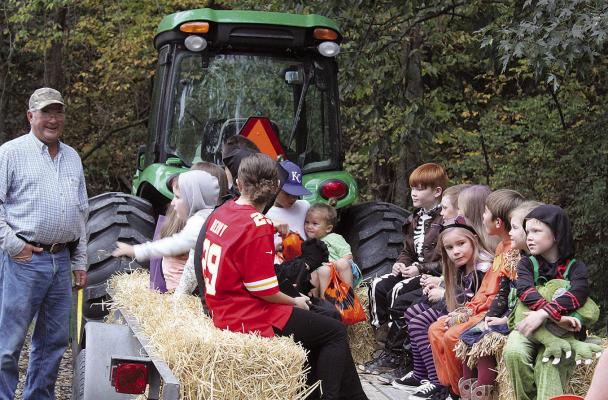 FAMILIES TAKE part in a hayride during the festivities. MIRANDA JAMISON | Staff
