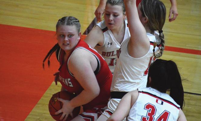 LEXI BOKARAE looks to get out of a baseline trap Monday against Odessa. SHAWN RONEY | Staff