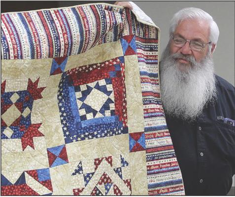 JAMES JONES receives a Quilt of Valor recognizing his U.S. Air Force service from 1976 to 1979, during which he completed training at Chanute Air Force Base before serving at Richards-Gebaur Air Force Base. MIRANDA JAMISON | Staff