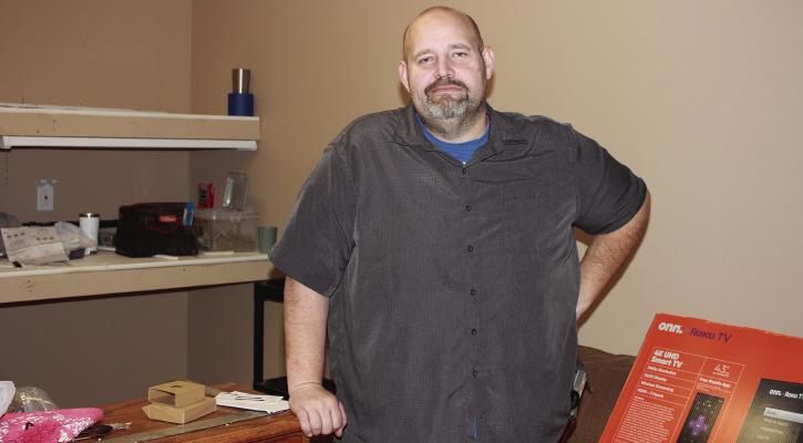 RAY COUNTY SHERIFF Scott Childers stands in the newly-built office of Detective Josh Hammer. Hamner needed a forensic space of his own for his work with the Ray County Internet Crimes Against Children Task Force, said Childers. SOPHIA BALES | Staff