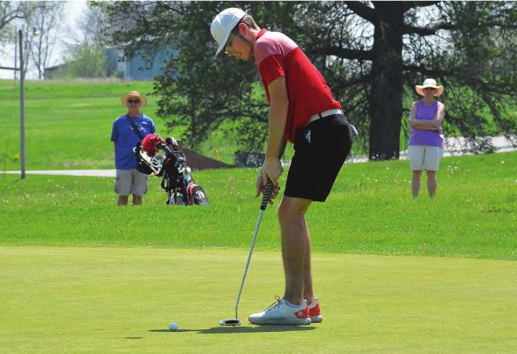 RICHMOND SENIOR Aiden Bowman, headed to state competition for the second straight season, putts Monday afternoon during the Class 2 District 4 Tournament at Shirkey Golf Course. SHAWN RONEY | Staff