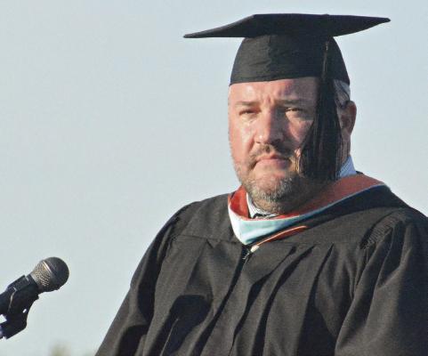 RICHMOND HIGH SCHOOL Principal Brandon Quick presides over the recent commencement ceremony at Spartan Stadium.