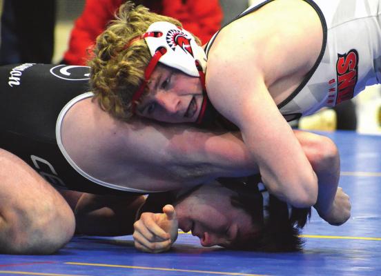 RICHMOND SENIOR Conner Teat, in the upper position in the 132-pound title match Feb. 12 at the Class 1 District 3 Tournament at Lafayette County of Higginsville, is appearing in state competition one last time. SHAWN RONEY | Staff