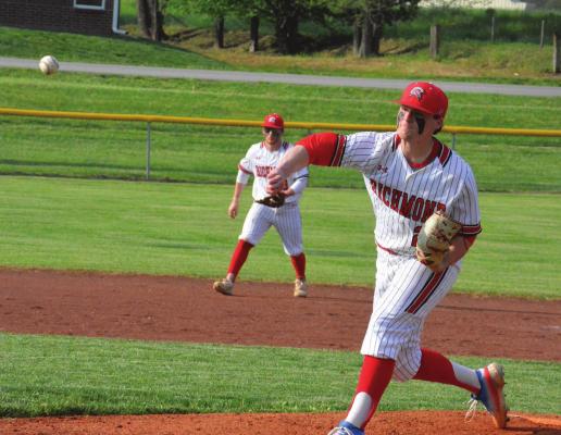 RICHMOND SENIOR pitcher Lucas Rodenberg delivers late in the Spartans’ 1-0 Missouri River Valley Conference East Division victory over Holden on Tuesday at Southview Park. SHAWN RONEY | Staff