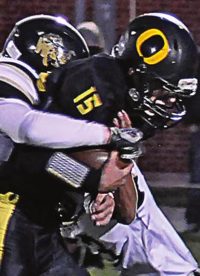 ORRICK FRESHMAN Jaxon Miller fights for yards against Worth County/ Northeast Nodaway. SHAWN RONEY | Staff