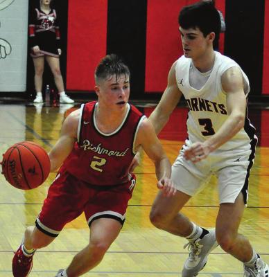 JUNIOR LAYNE CAVANAH, seen dribbling here during the Class 3 District * title game against Chillicothe, is among the guards who will be call upon to fill the void for Richmond left by the graduation of Dionte Marquez. SHAWN RONEY | Staff