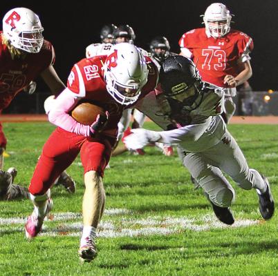 WITH THE PANTHERS in striking distance in a 20-12 game, senior running back Evan Vandiver carries to the 3, but penalties send the ball back to the 34. Later, at the 23, quarterback Keyshaun Elliott tosses a TD pass to junior wideout Trevin Quick. Senior running back Aidan Ivison’s conversion puts the Spartans up 28-12, all they need to win. J.C. VENTIMIGLIA | Staff