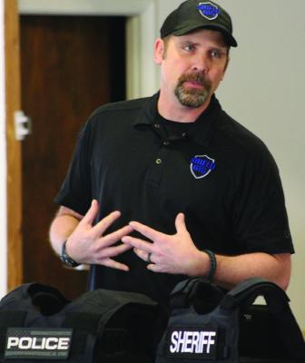 SHIELD 616 Founder Jake Stifskad introduces himself and the charity program for law enforcement. SOPHIA BALES | Staff
