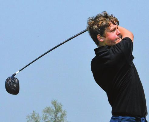 JACOB McELWEE of Orrick watches one of his drives during the Class 1 District 4 Tournament on Monday at Excelsior Springs Golf Course. SHAWN RONEY | Staff