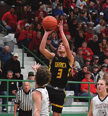 JUNIOR ZANDER STEVINSON attempts a fourth-quarter jump shot for the Bearcats on Feb. 25 in the Class 1 District 13 Tournament title game. SHAWN RONEY | Staff