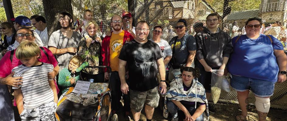 SPECIAL NEEDS SERVICES families enjoyed a day at the Kansas City Renaissance Festival thanks to tickets donated by the Richmond News. Shown here are James Abraham (back row, from left), Angelica Davis, Rosella Davis, Matt Pearon, Ryan Martin, Karen Park, Stephanie Hardwick, Dakota Treaster and Rebecca Smith. Also, Elvis Davis (front row, from left), Crystal Pearon, Jonathon Davis, Scott McCoy and Kristina Neilon. CAITLIN CROWLEY | Submitted