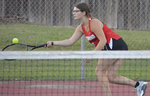 AVA BOZARTH stretches to attempt a forehand shot during Richmond’s Missouri River Valley Conference-East Division dual with Lexington. SHAWN RONEY | Staff
