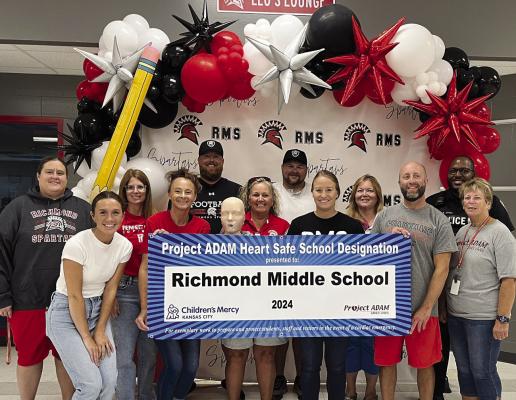 RMS STAFF celebrates receiving Project ADAM Heart Safe school designation. Submitted