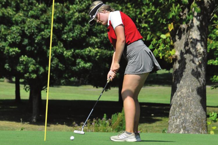 JUNIOR KENNEDY WRISINGER, seen here putting during a September tournament, is among three Richmond girls golfers headed for state. SHAWN RONEY | Staff