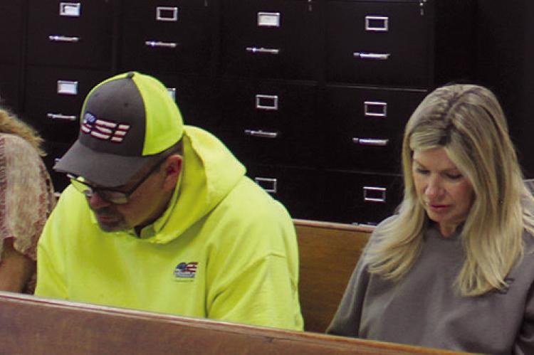 TOWING OPERATORS and county officials review a proposed towing resolution during a lengthy discussion about dispatch rotations, response times and business-location requirements for towing companies operating in the county. MIRANDA JAMISON | Staff