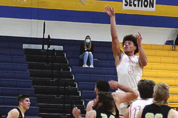 JUNIOR KEYSHAUN ELLIOTT, seen taking a short jumper, and fellow Richmond big man Jack Gogue are too much for Windsor on Tuesday. J.C. VENTIMIGLIA | Staff