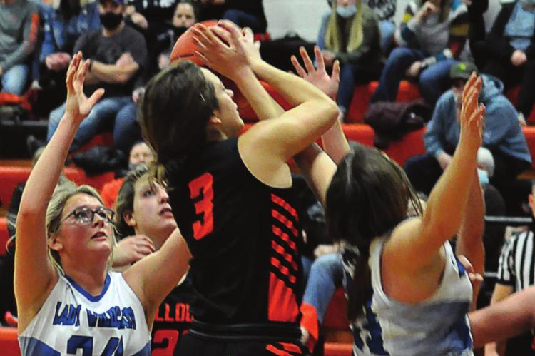 ALYSSA RECHTERMANN, No. 3, helps the Bulldogs avenge their loss to Southwest of Livingston County. SHAWN RONEY | Staff
