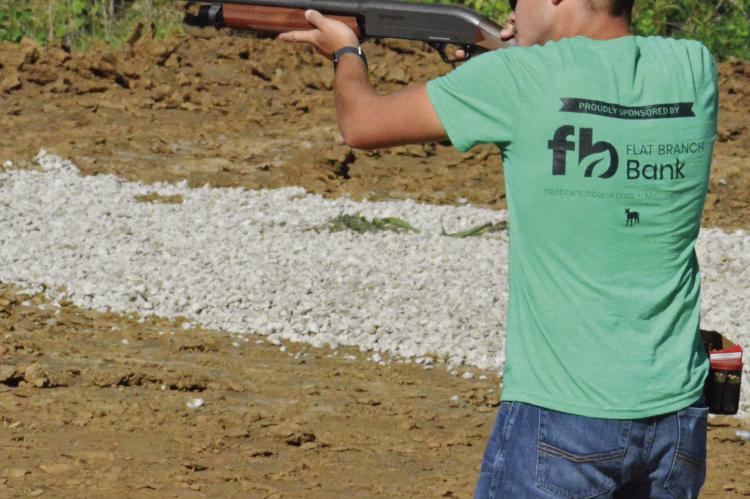 AIDEN O’DELL, a member of the Millville 4-H Club, takes aim during the trap shooting competition at the Ray County Fair. SHAWN RONEY | Staff