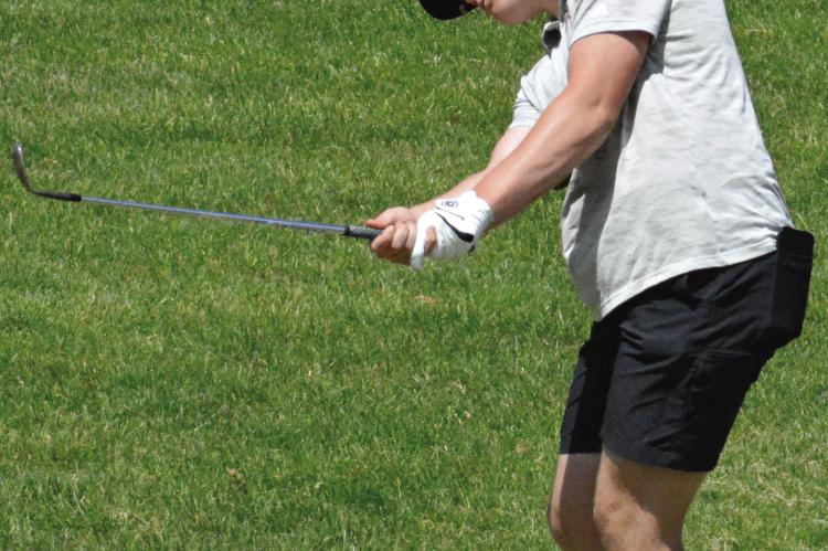 BRODY FARNAN, shown playing for Richmond at district competition, has continued to get in rounds of golf at Shirkey Golf Course since his high school season wrapped with the Class 3 state tournament in Sedalia. SHAWN RONEY | Staff