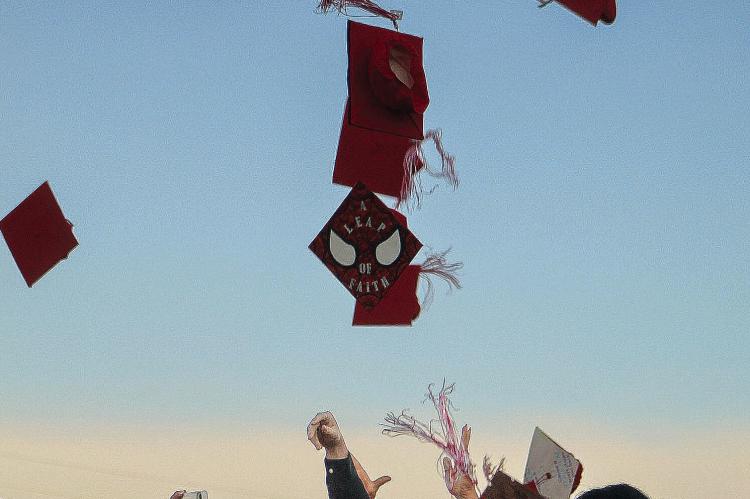 MEMBERS OF THE Richmond High School Class of 2026 toss their caps into the air, marking the end of their graduation ceremony and the beginning of a new chapter in life. SHARON DONAT | Staff