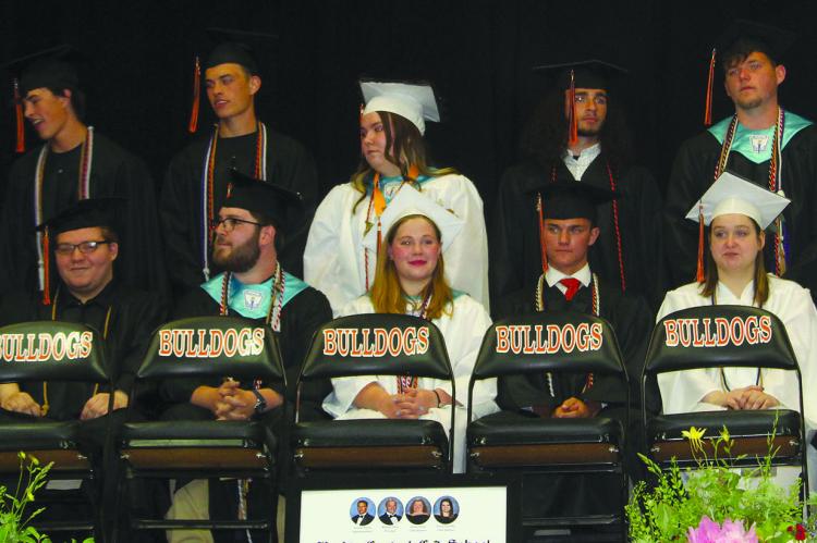 HARDIN GRADUATES celebrate their achievements as they proudly walk across the stage during the commencement ceremony. MIRANDA JAMISON | Staff