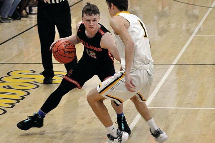 HARDIN-CENTRAL freshman Mason McCaulley looks to dribble around Orrick senior Gabe McAfee Friday night in varsity boys basketball action. Sparked by a 10-2 opening run, Orrick leads 13-6 after one quarter. Hardin-Central, however, makes it a two-point ballgame by outscoring Orrick 15-10 the second quarter. The Bearcats respond by outscoring the Bulldogs 32-22 the second half to win their homecoming 55-43.