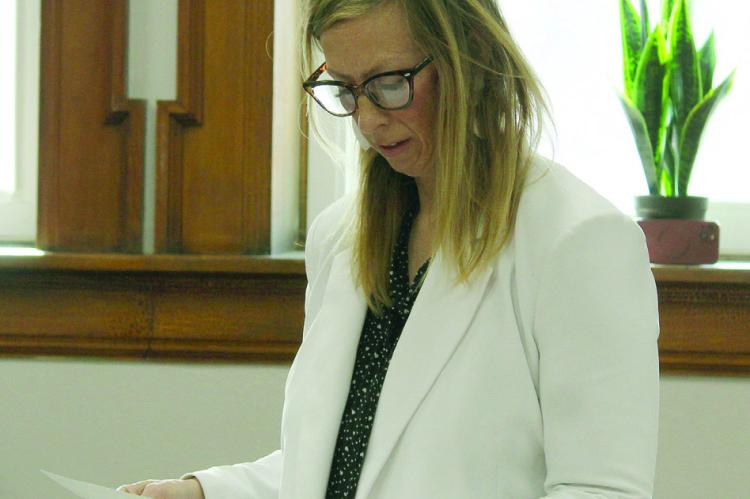 RAY COUNTY PROSECUTING Attorney Camille Johnston explains discovery requirements and dismissed case figures while presenting information to commissioners. MIRANDA JAMISON | Staff