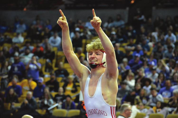 SENIOR CONNER TEAT celebrates after a victory during the Class 1 state boys wrestling tournament. He finishes third in the 132-pound division. SHAWN RONEY | Staff